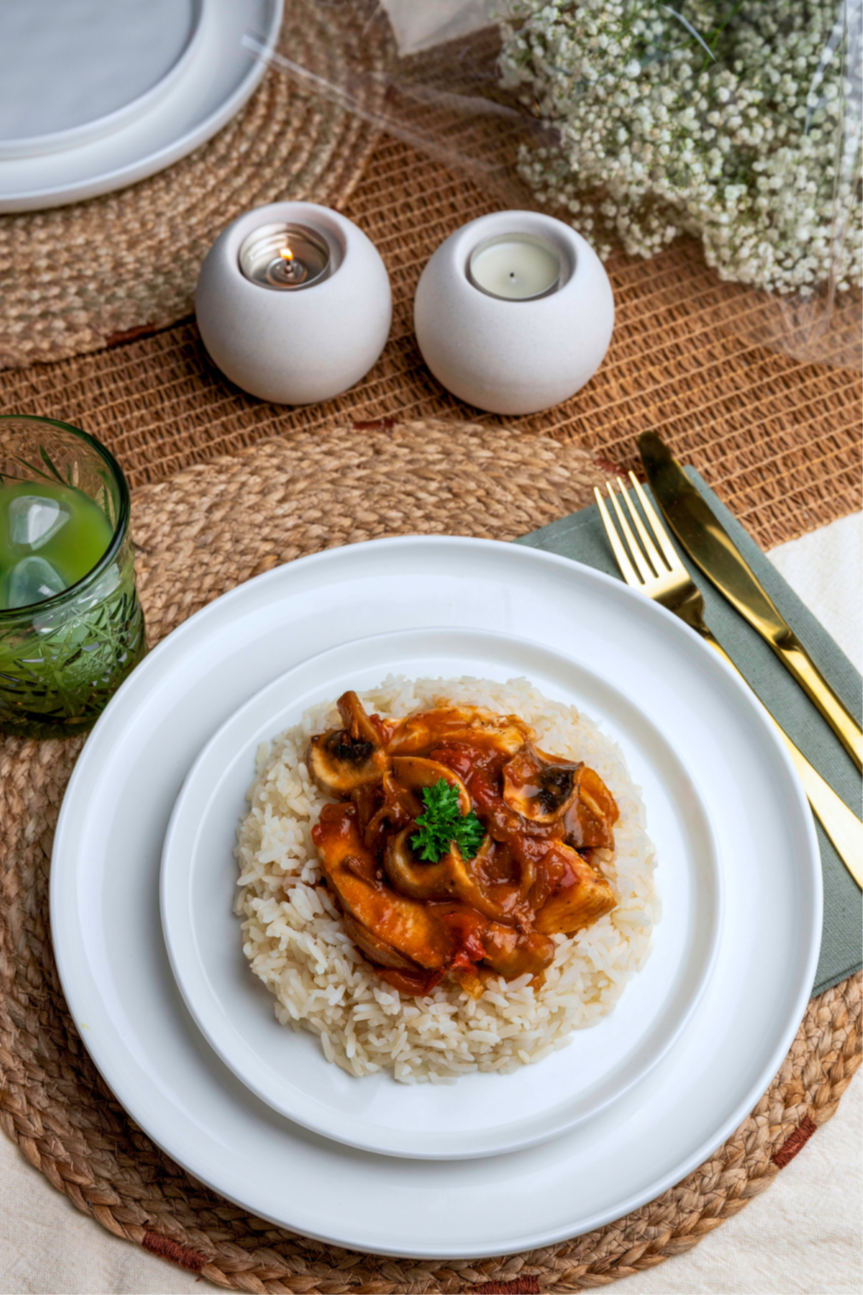 Kalfsblanquette met tomaten-champignonsaus en rijst Weekly