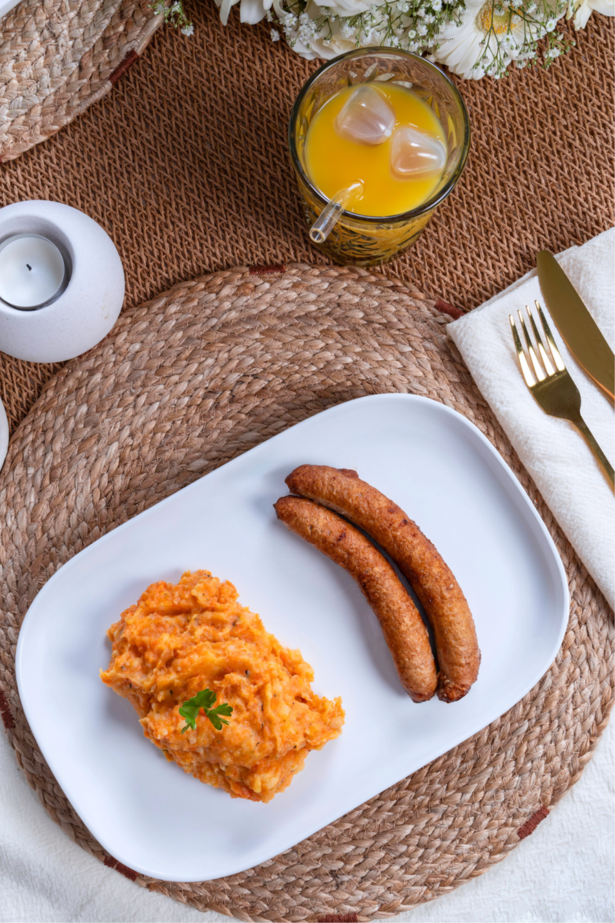 Stoemp de carottes maison et saucisse de poulet